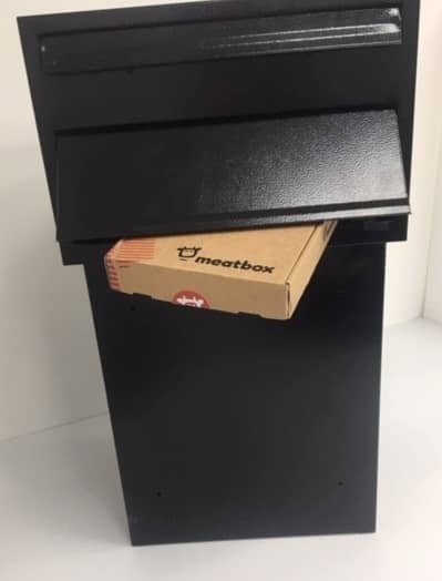 Sigma Parcel box showing a Meatbox Gift Box being mailed