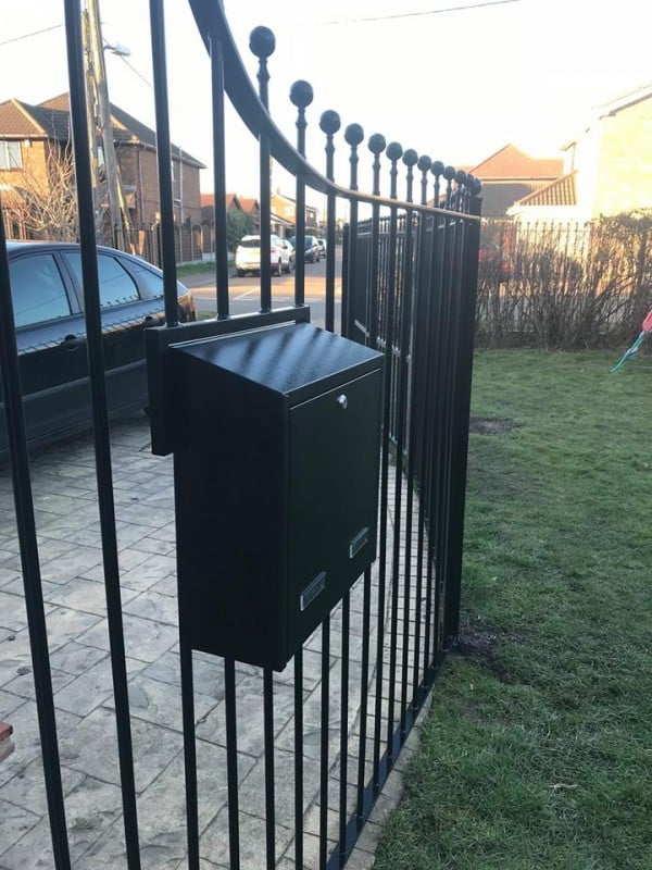 W3 Metal Post Box mounted on metal railings